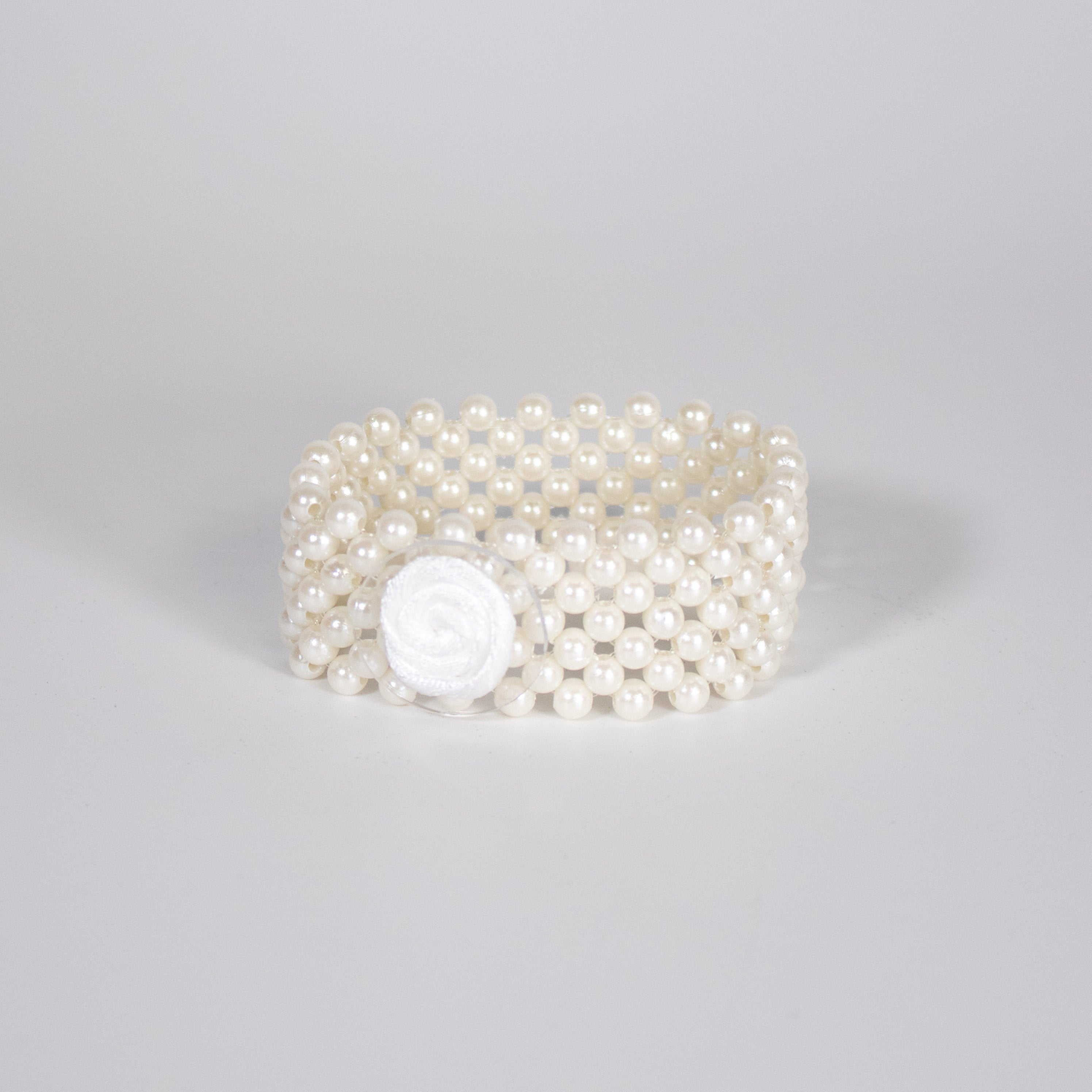 Plain Cream Organza Wrist corsage on an elasticated pearl bracelet 010223   Fascinators4u